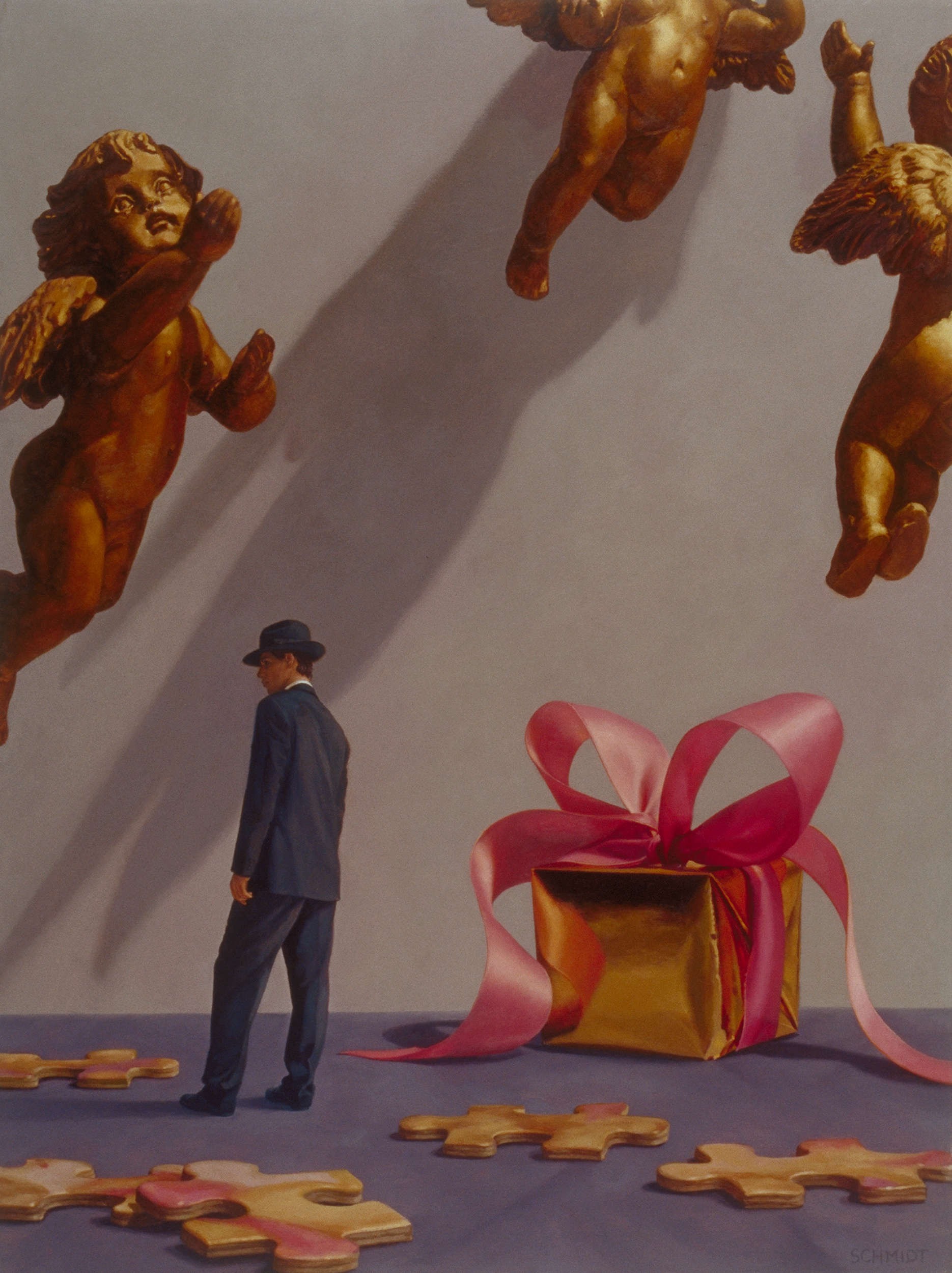 3 gold cherub angels flying, shadows on wall, gift wrapped in gold paper and pink satin ribbon, diminutive male figure wearing suit and fedora hat, puzzle pieces on floor