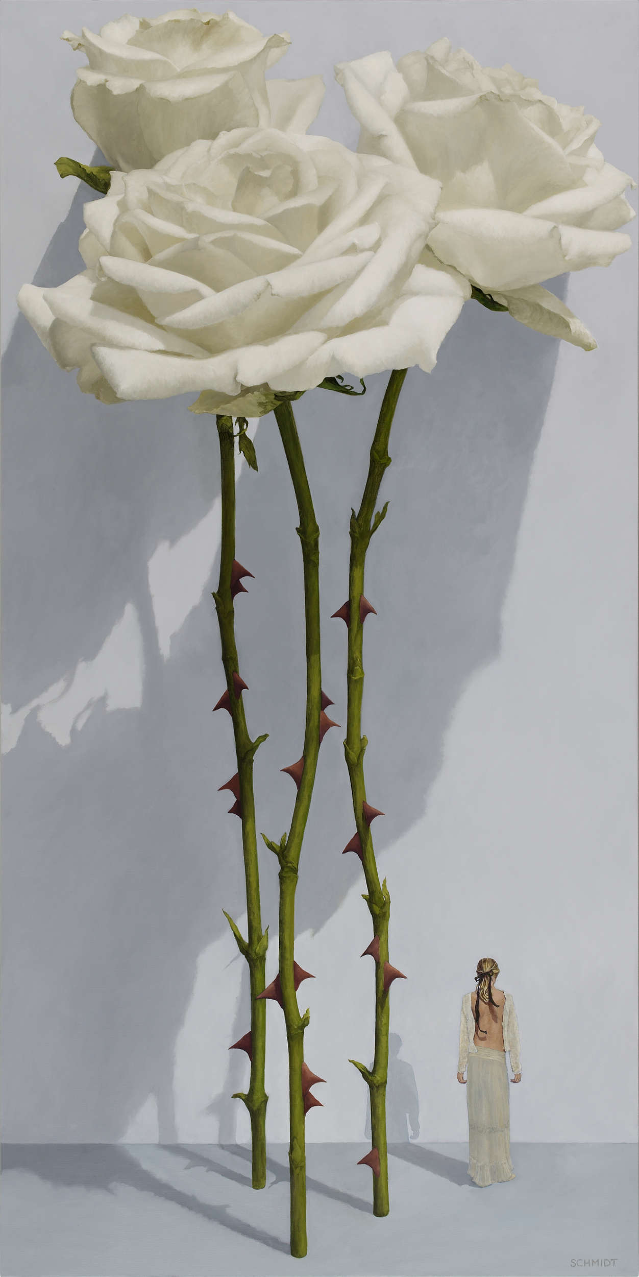 3 white roses standing and opened, light gray wall with shadows, diminutive female figure (Sophie with arms down)dressed in white