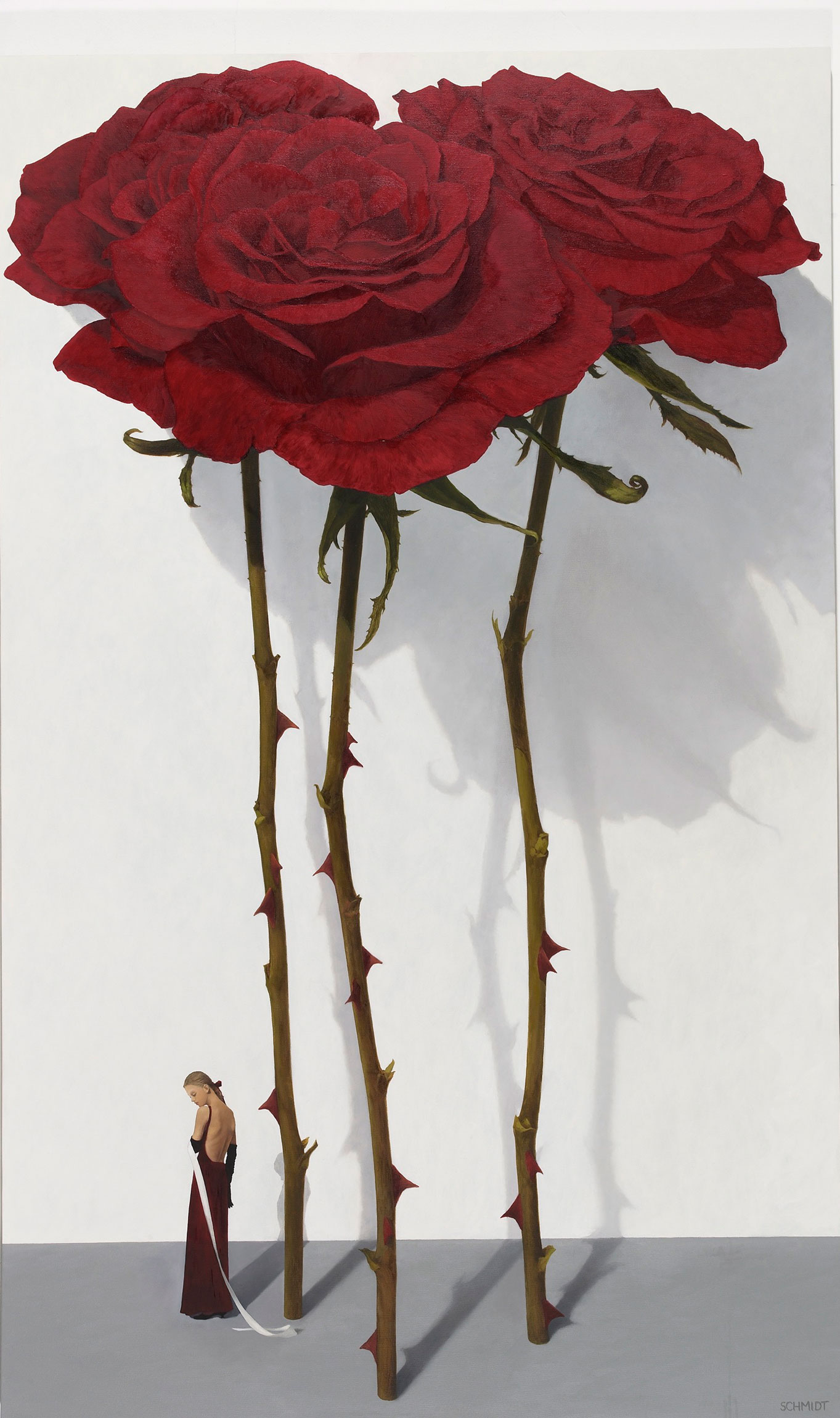 3 red roses with stems and thorns,  shadows on white wall, diminutive female figure (Samantha) holding a ribbon