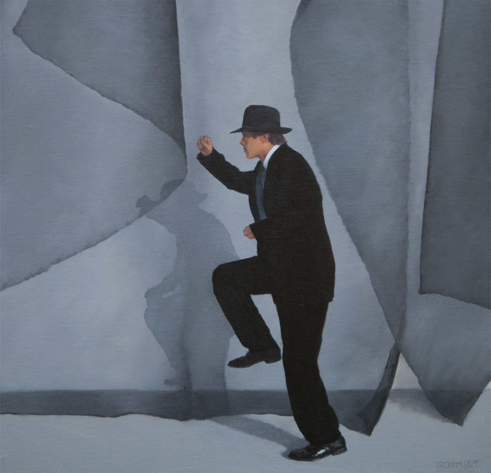 Man running wearing fedora hat and suit